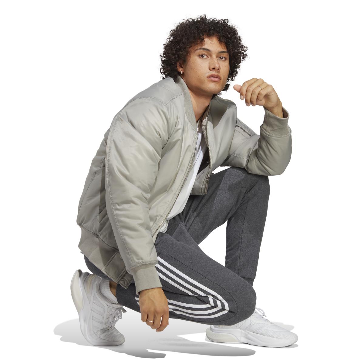 product/a/d/adidas_ic9408_5_apparel_on_model_walking_view_white.jpg
