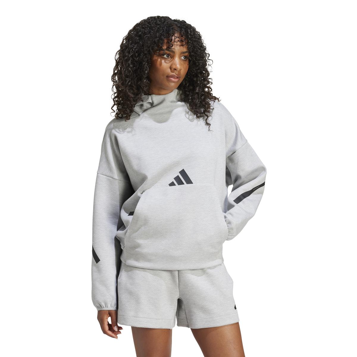 product/a/d/adidas_jd9592_5_apparel_on_model_walking_view_white.jpg