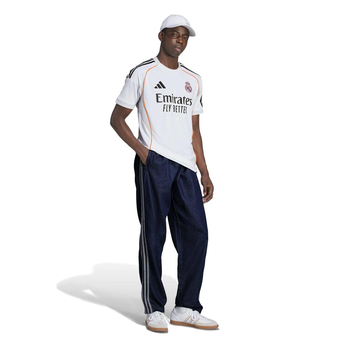 product/a/d/adidas_jj1931_5_apparel_on_model_walking_view_white.jpg