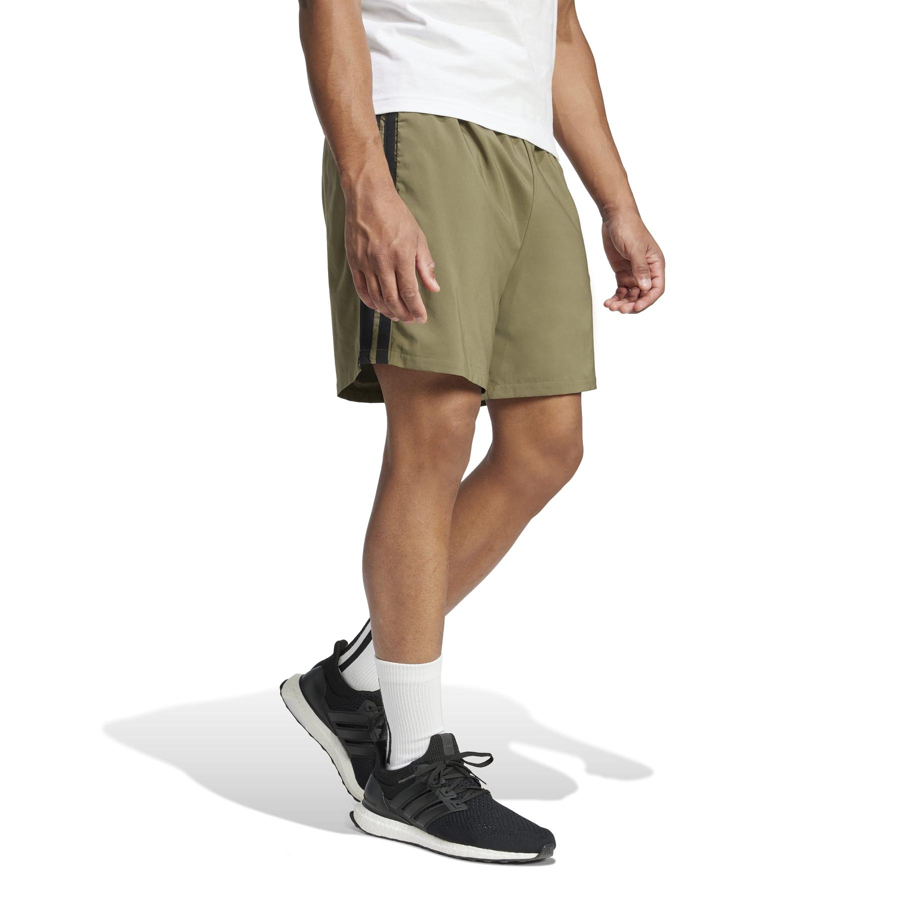 product/2/0/2025_adidas_je6434_5_apparel_on_model_walking_view_white.jpg