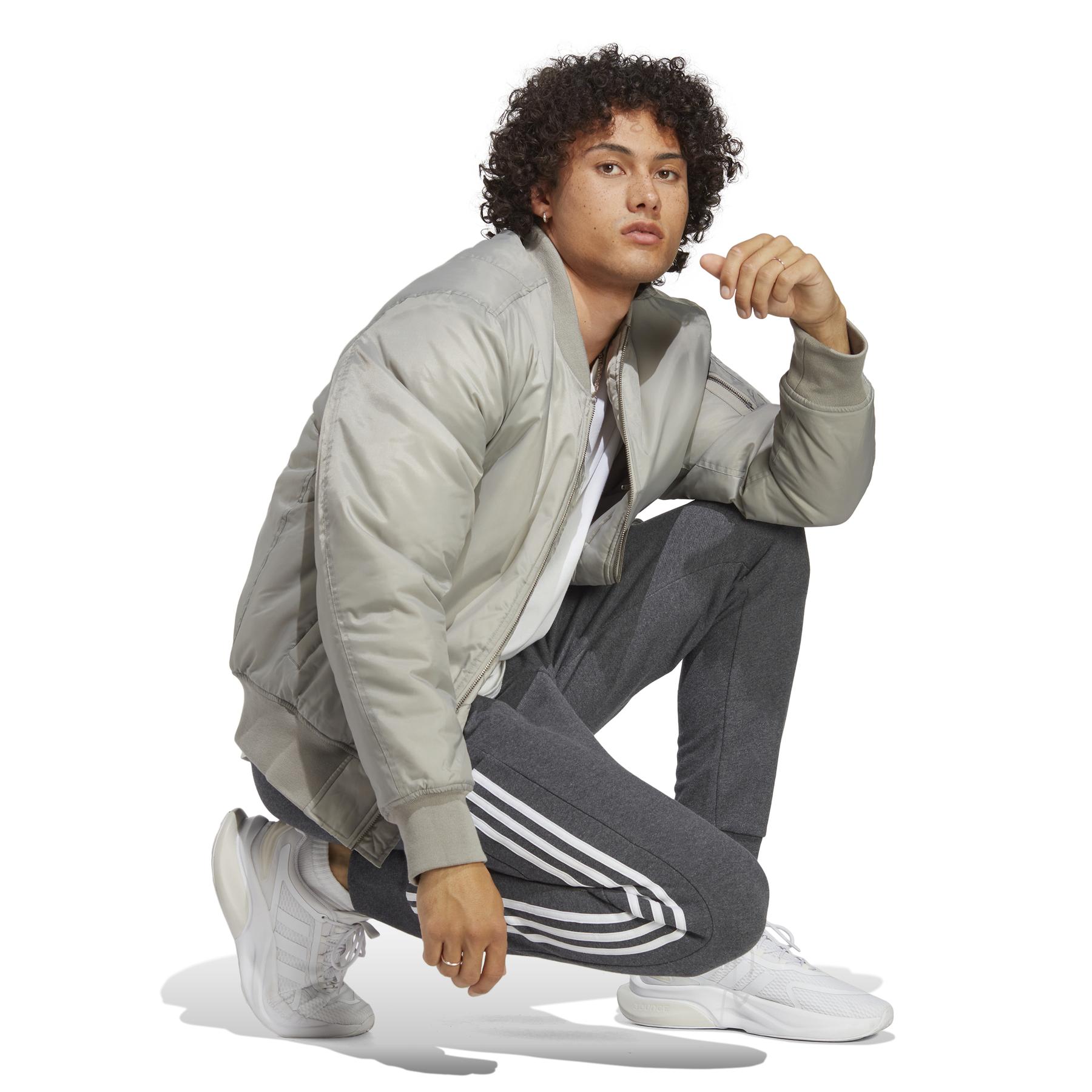 product/a/d/adidas_ic9408_5_apparel_on_model_walking_view_white.jpg