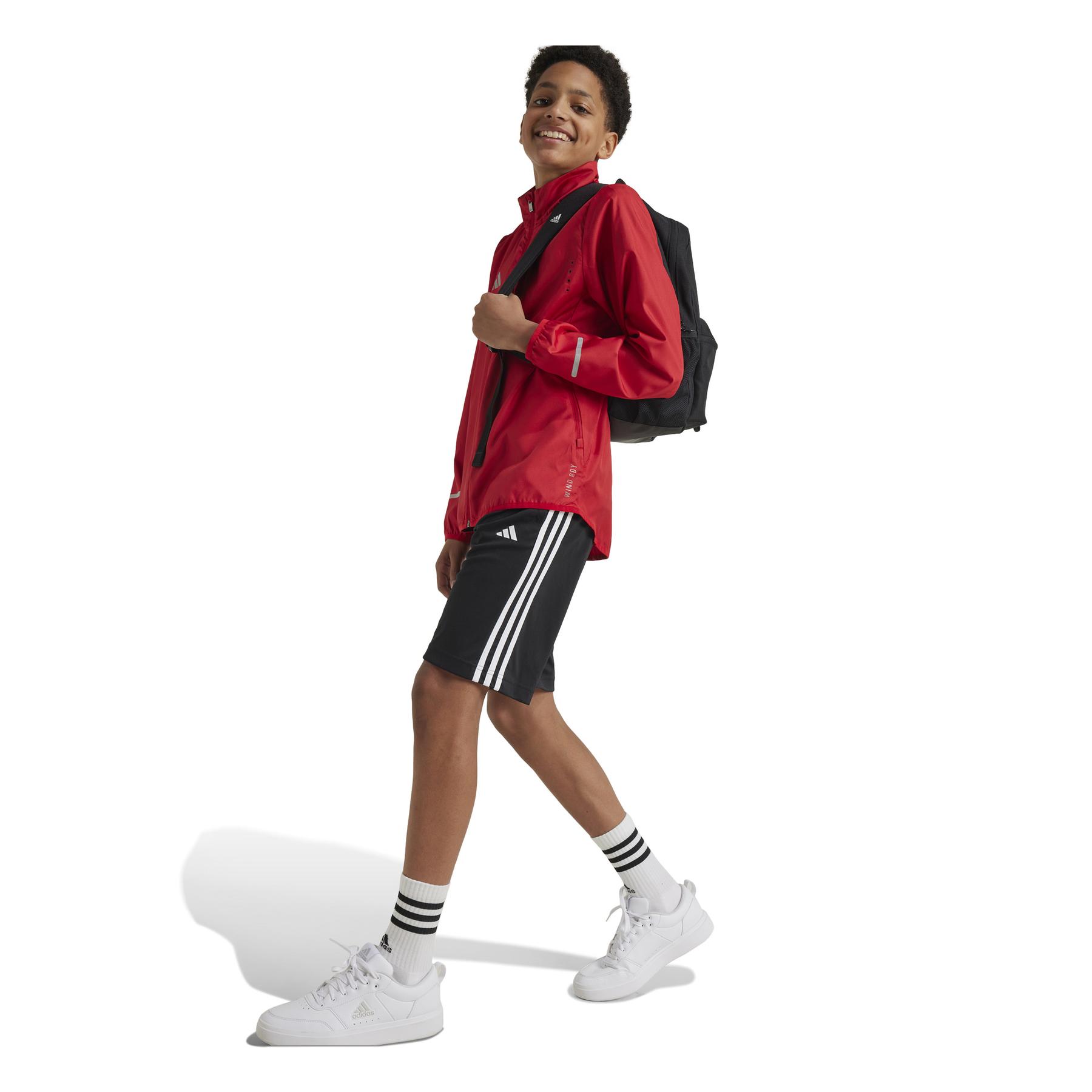 product/a/d/adidas_iv7169_5_apparel_on_model_walking_view_white.jpg