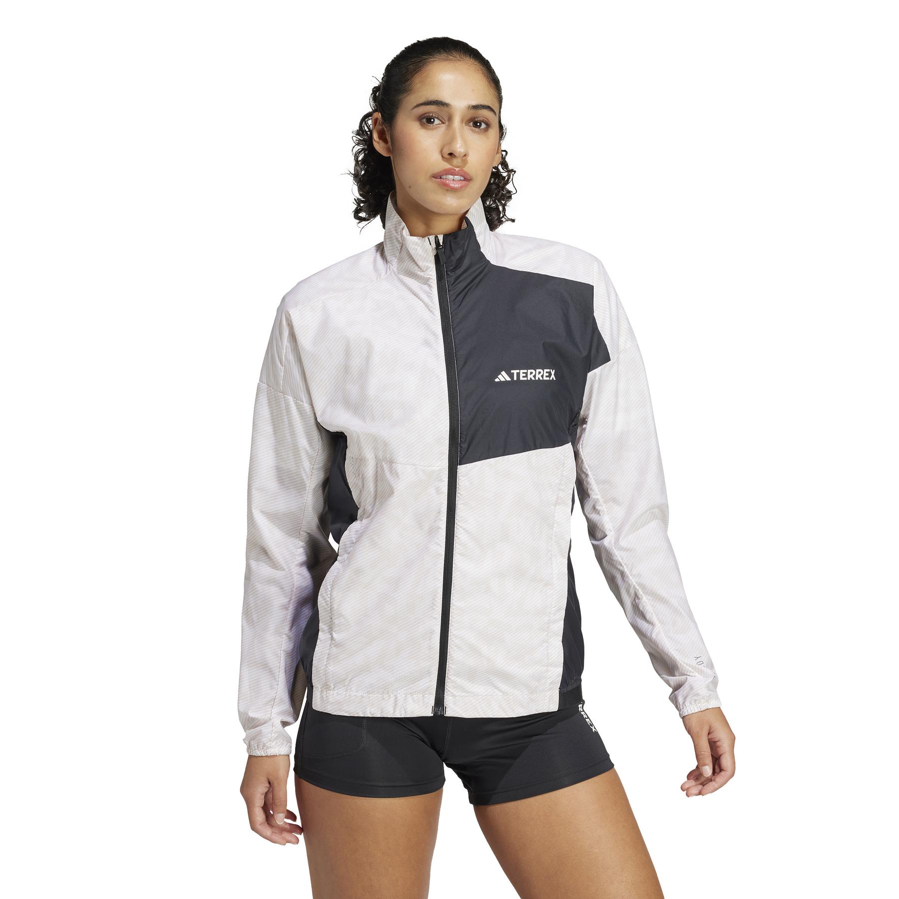 product/a/d/adidas_iw9245_6_apparel_on_model_walking_view_white.jpg