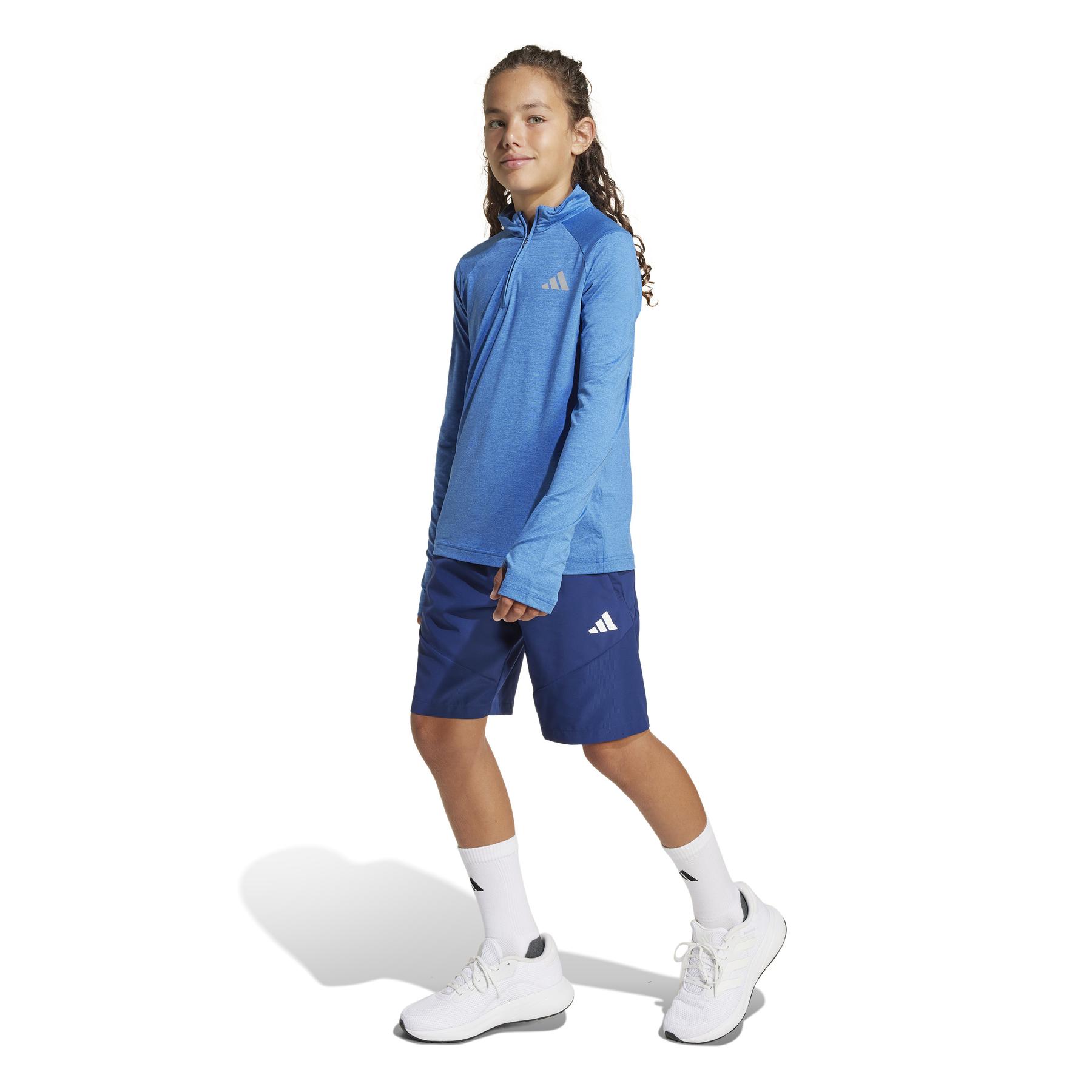 product/a/d/adidas_jd0129_4_apparel_on_model_walking_view_white.jpg