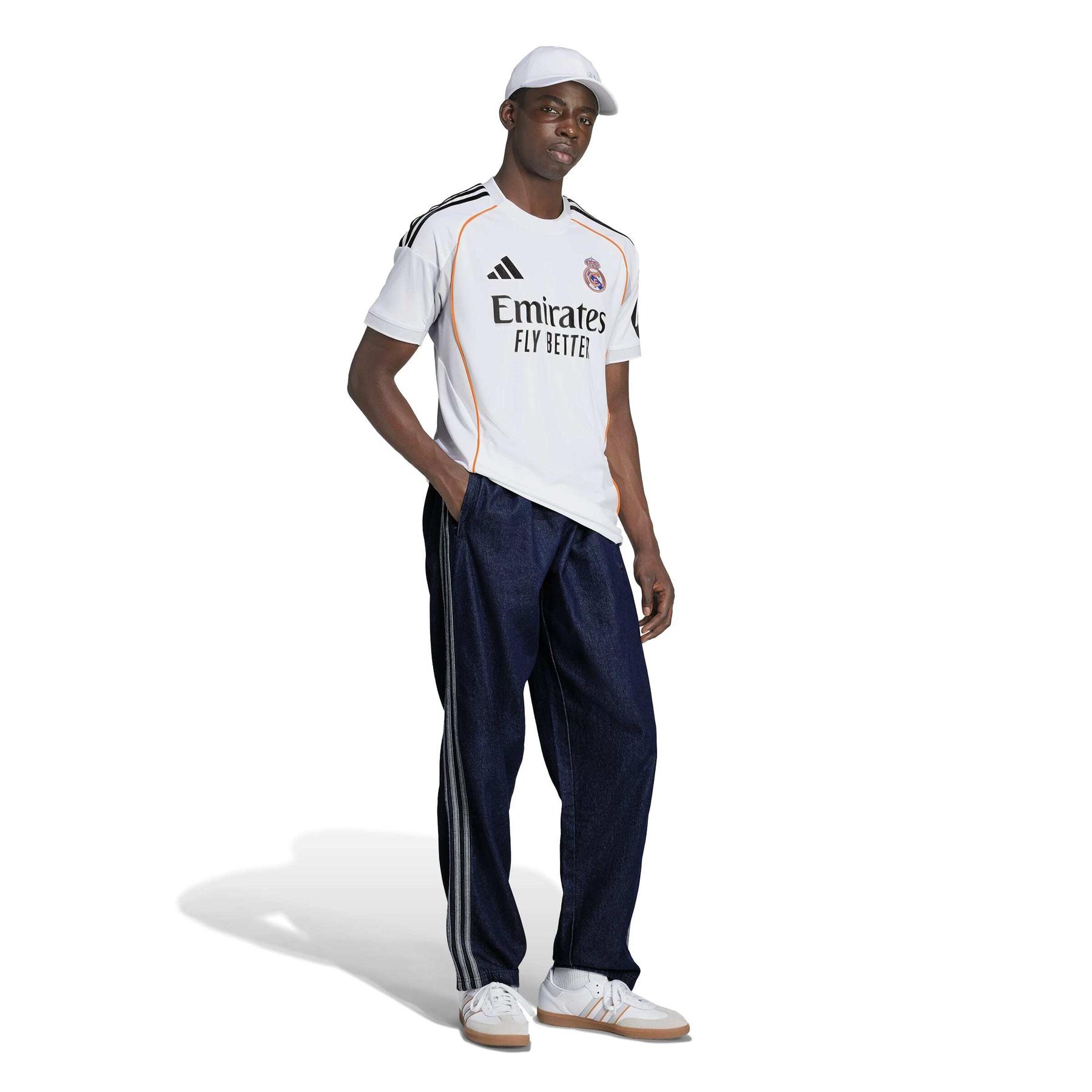 product/a/d/adidas_jj1931_5_apparel_on_model_walking_view_white.jpg