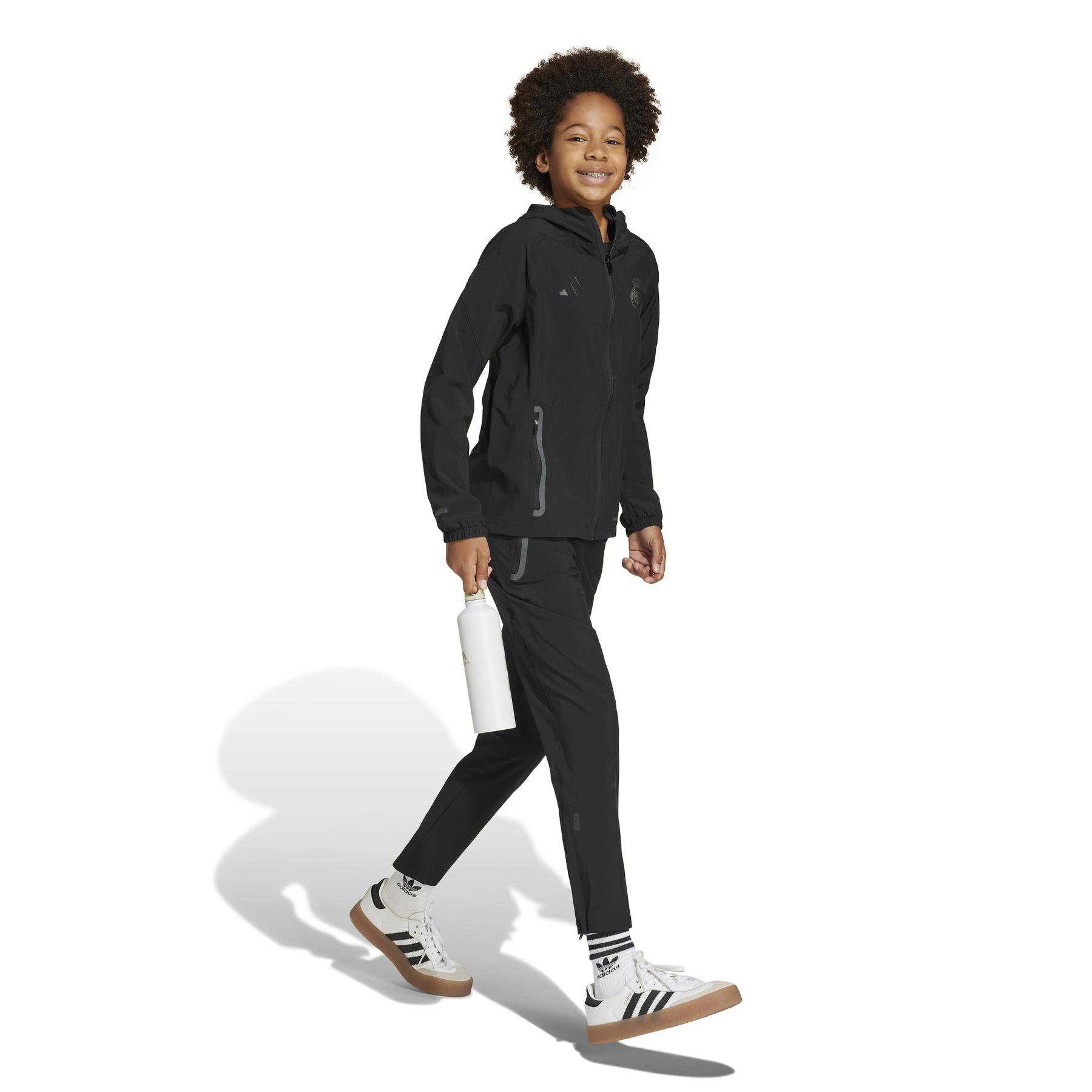 product/a/d/adidas_jw7372_4_apparel_on_model_walking_view_white.jpg