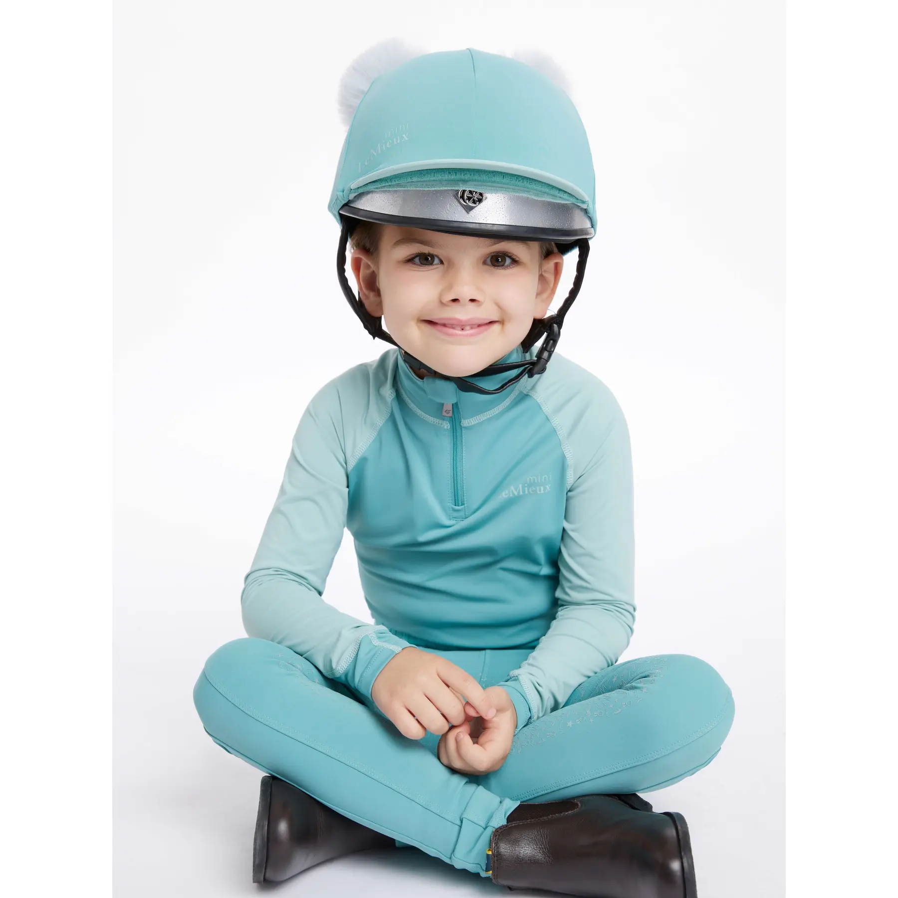 Cascopello per casco da equitazione con doppio pon-pon per bambini LeMieux