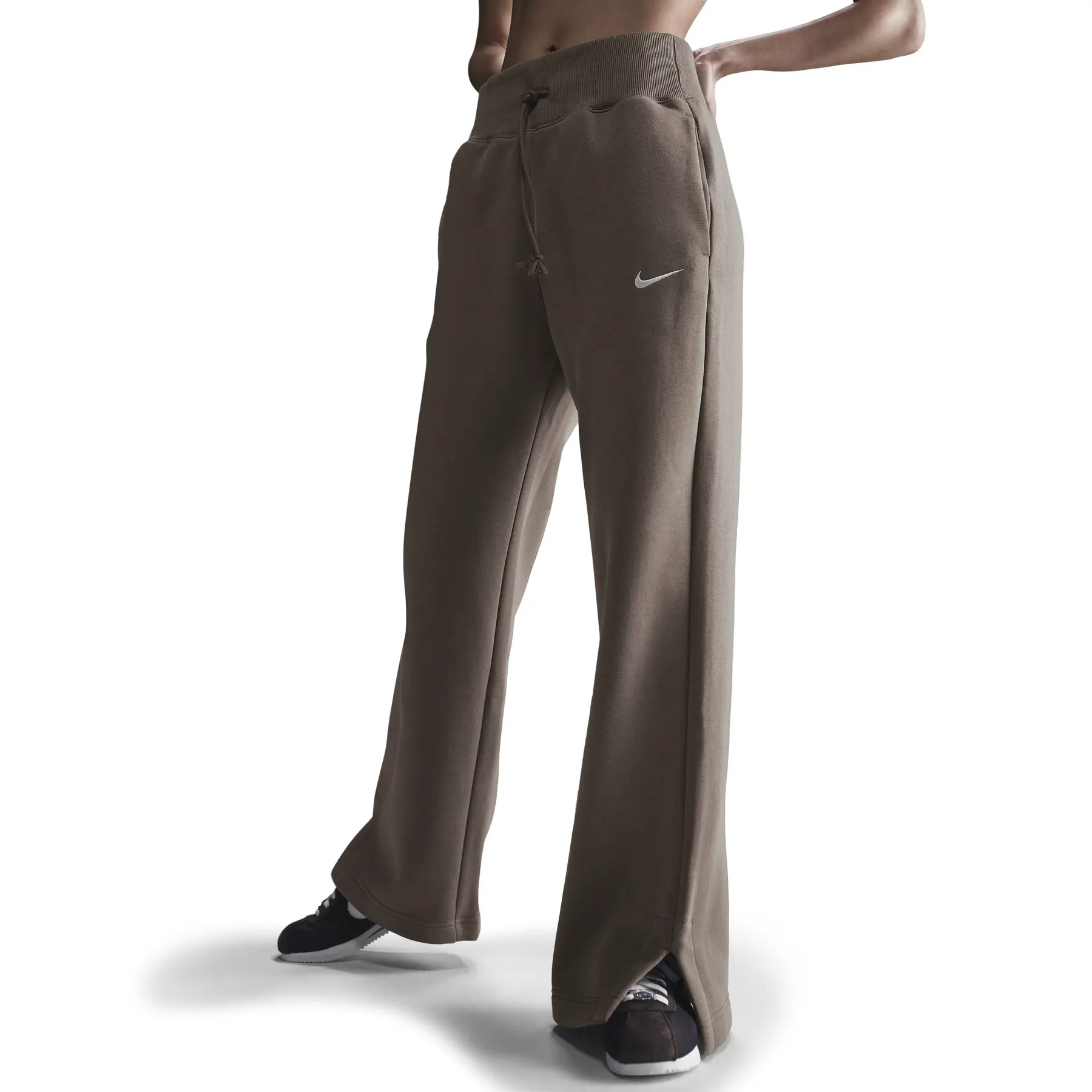 Loose-fitting women's tracksuit trousers Nike Phoenix | Foot-Store