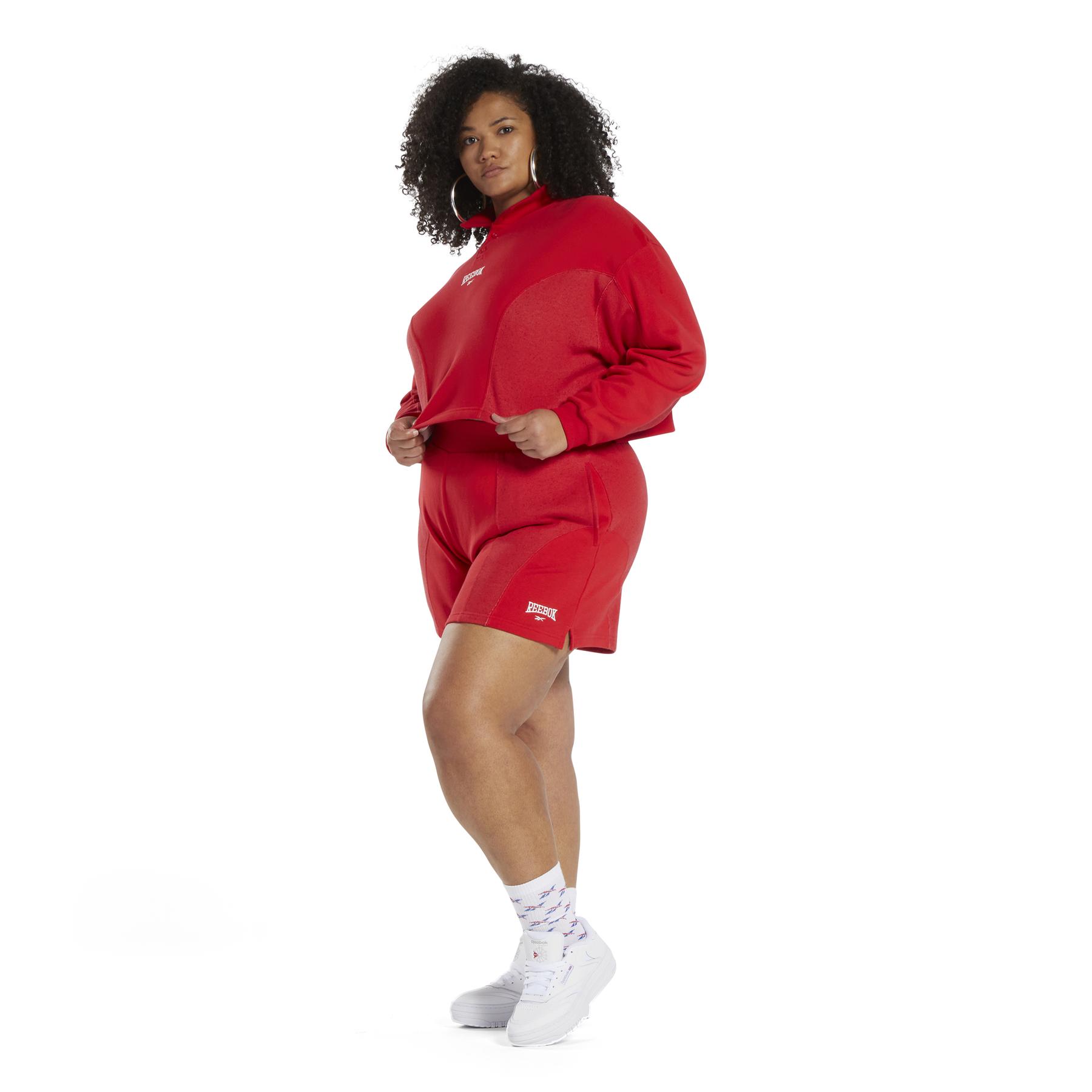 product/r/e/reebok_hr5946_5_apparel_on_model_side_view_white.jpg