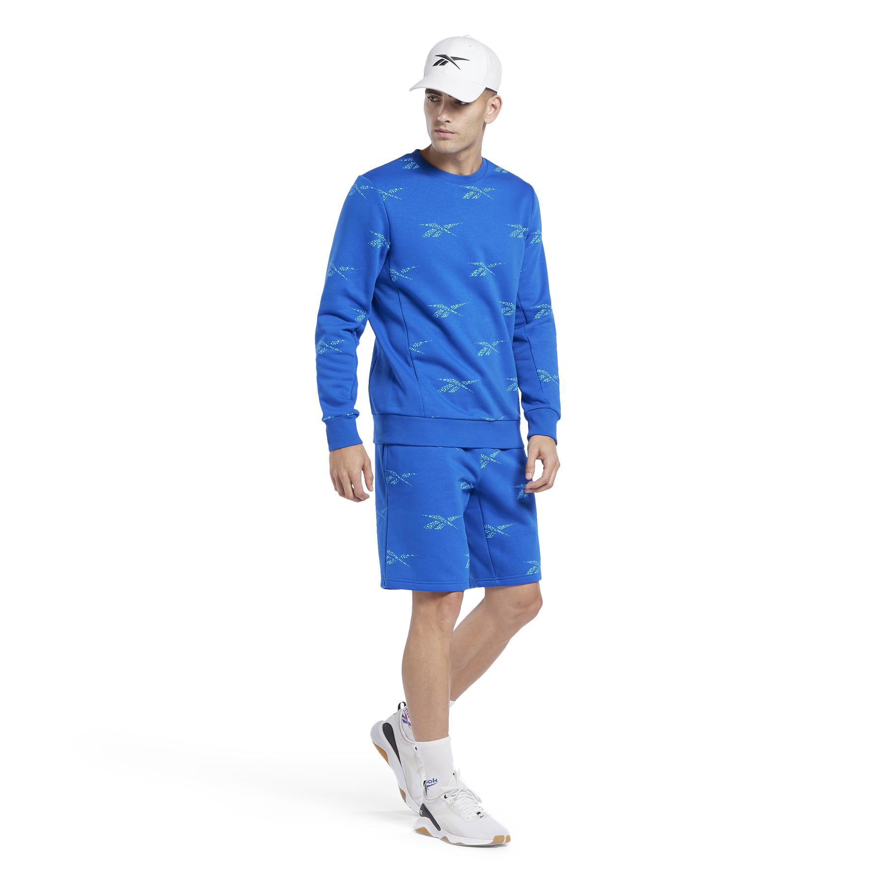 product/r/e/reebok_ib8449_4_apparel_on_model_side_view_white.jpg