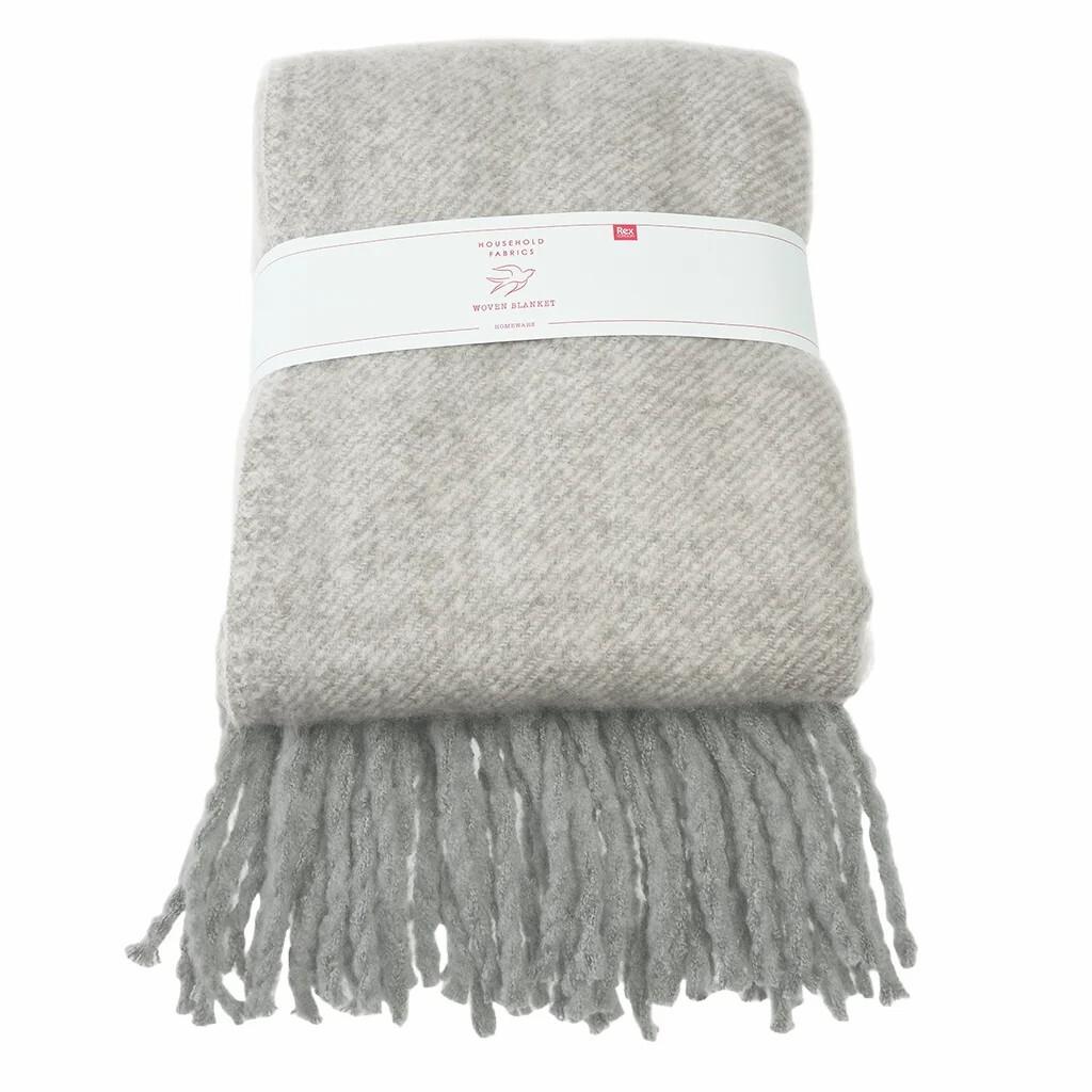 5027455447247 - Gewebte Decke mit Pompons Rex London