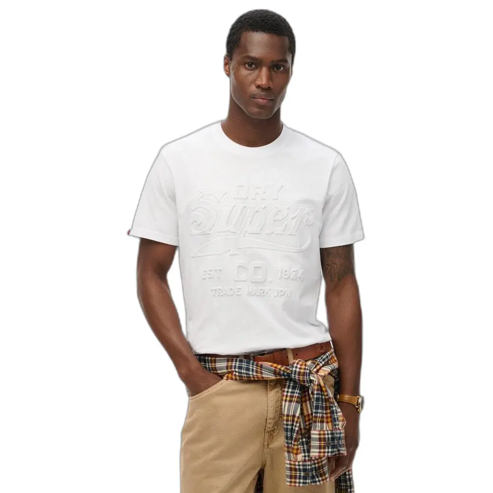 T-shirt con logo in rilievo