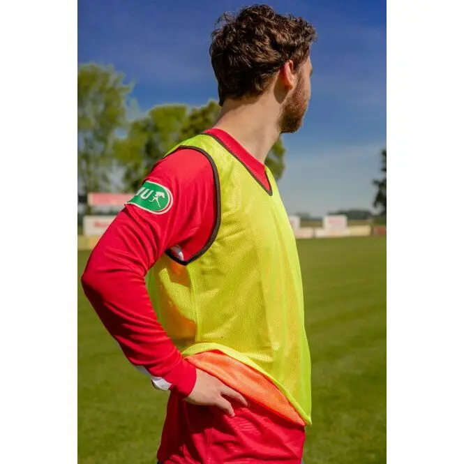 Gelb-orangefarbenes, wendbares Trainingsleibchen PowerShot