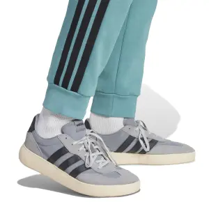 Calças de suor adidas Essentials Three Stripes image-5