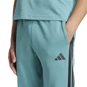 Calças de suor adidas Essentials Three Stripes image-6