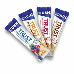 Paquete de 12 barritas de proteínas trust flapjack 70g image-1