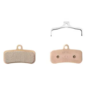 Ein Paar Fahrradbremsbeläge aus Metall und Rückfederung mit Splint Shimano D02S-MX image-1