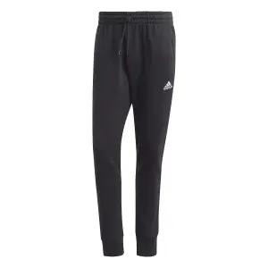 Pantaloni da jogging in pile con polsini affusolati adidas Essentials
