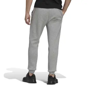 Spodnie dresowe zwężane z dresówki adidas Essentials image-3