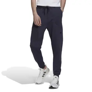 Fleece joggingsbyxor adidas Studio Lounge image-1