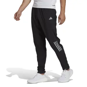 Pantalón de chándal adidas Own the Run Woven Astro image-1