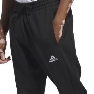 Pantalones de chándal con puños adidas Essentials 3-Stripes image-4