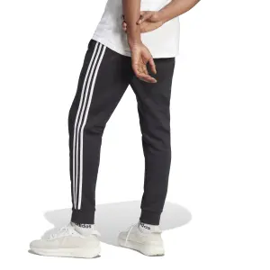 Fleece Jogginghose mit schmaler Passform adidas Essentials 3-Stripes image-4