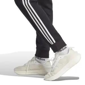 Fleece Jogginghose mit schmaler Passform adidas Essentials 3-Stripes image-6