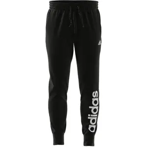 Pantaloni da jogging in felpa con logo e caviglie affusolate adidas Essentials