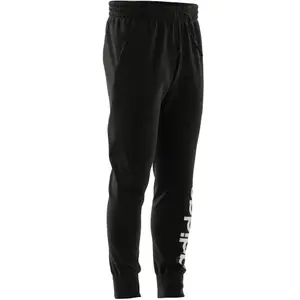 Pantaloni da jogging in felpa con logo e caviglie affusolate adidas Essentials image-6