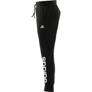 Pantaloni da jogging in felpa con logo e caviglie affusolate adidas Essentials image-5