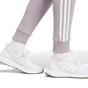 Joggingbyxor för kvinnor adidas Essentials Fleece 3-Stripes image-5