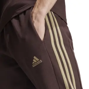 Slim fit joggebukser med ribkant adidas Essentials 3-Stripes image-4