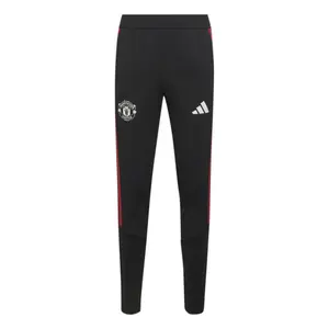 Spodnie treningowe dla dzieci Manchester United Tiro 26