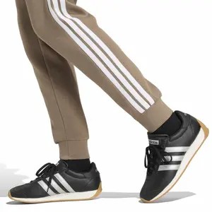 Pantalones de treino slim para mulher adidas Essentials 3-Stripes Fleece image-4