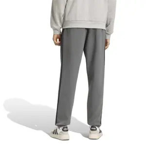 Pantalon de jogging tapered adidas Essentials 3-Stripes Fleece Cuffed image-3