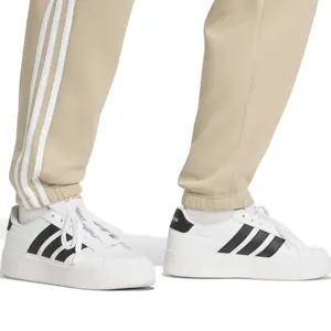 Tapered joggerbukser adidas Essentials 3-Stripes Fleece Cuffed image-4