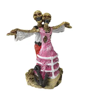 234-430101-dekorativt-foremal-exploderad-piratskalle-aqua-della-guld-bla-7-2x6x7-8-cm