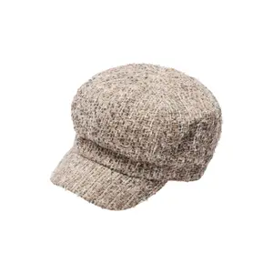 Woman hat COMMA image-0