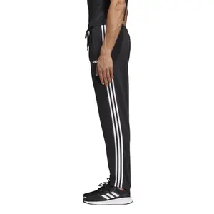Pantalón de chándal adidas Essentials 3-Stripes image-4