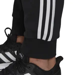 Pantalón de chándal adidas Essentials 3-Stripes image-6