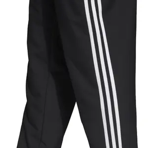 Pantalón de chándal adidas coupe-vent Essentials 3-Stripes image-6