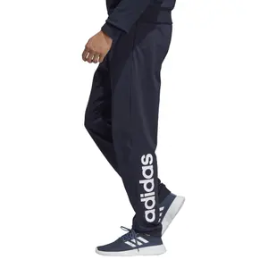 Pantalón de chándal adidas Essentials Linear Tapered image-4