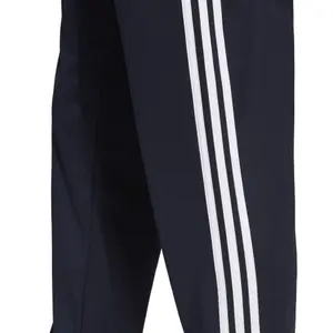 Pantalon de jogging adidas Essentials 3-Stripes Tapered Tricot image-6