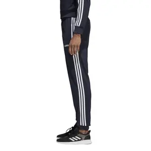 Pantalon de jogging adidas Essentials 3-Stripes Tapered Tricot image-4
