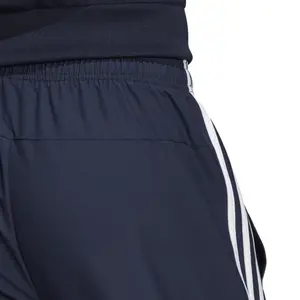 Pantalón de chándal adidas coupe-vent Essentials 3-Stripes image-6