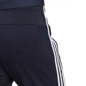Pantalón de chándal adidas Essentials 3-Stripes Tapered image-6