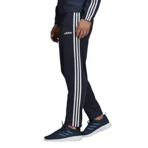 Pantalón de chándal adidas Essentials 3-Stripes Tapered image-4