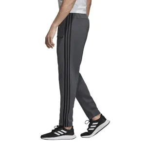 Joggingbyxa adidas Essentials 3-Stripes Tapered image-5