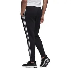 Pantalón de chándal adidas Must Haves 3-Stripes Tapered image-4